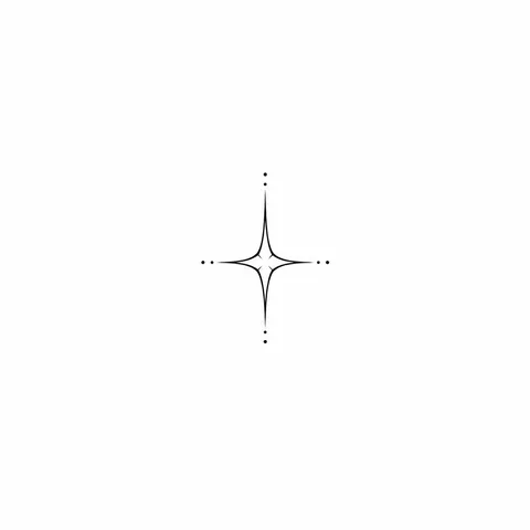 Tiny four point star tattoo