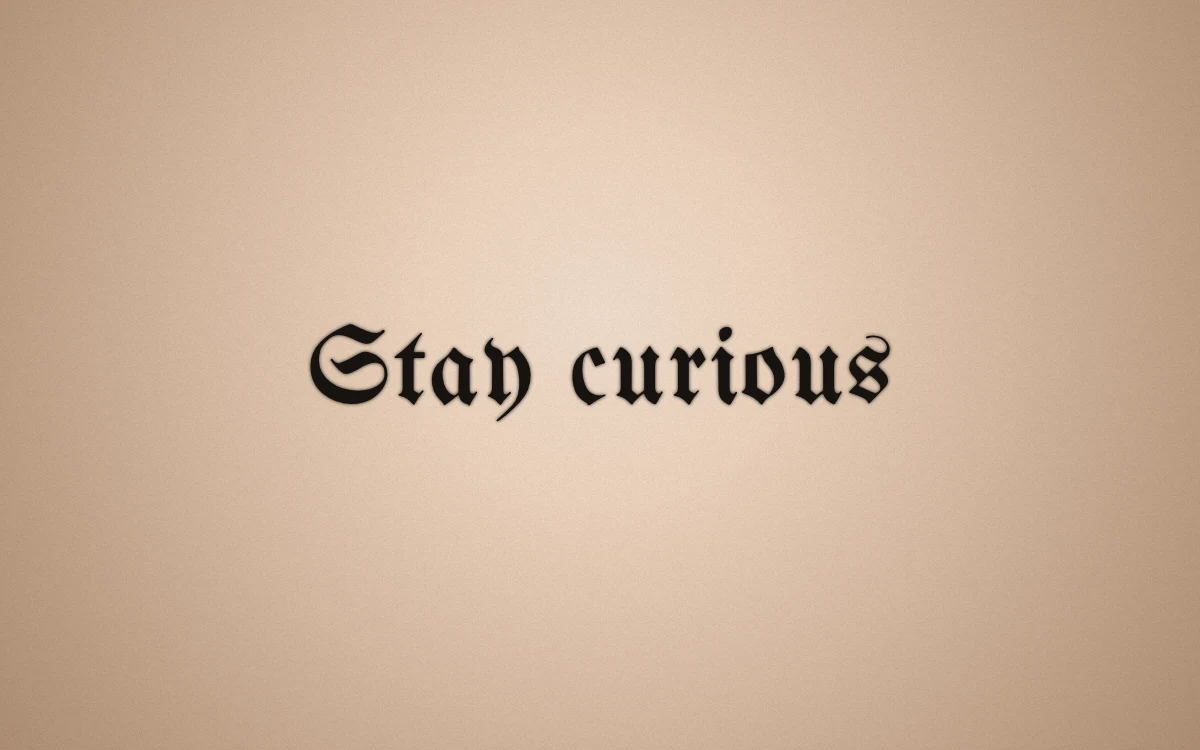 Stay curious rendered in Unifraktur Maguntia blackletter using the same lettering preview