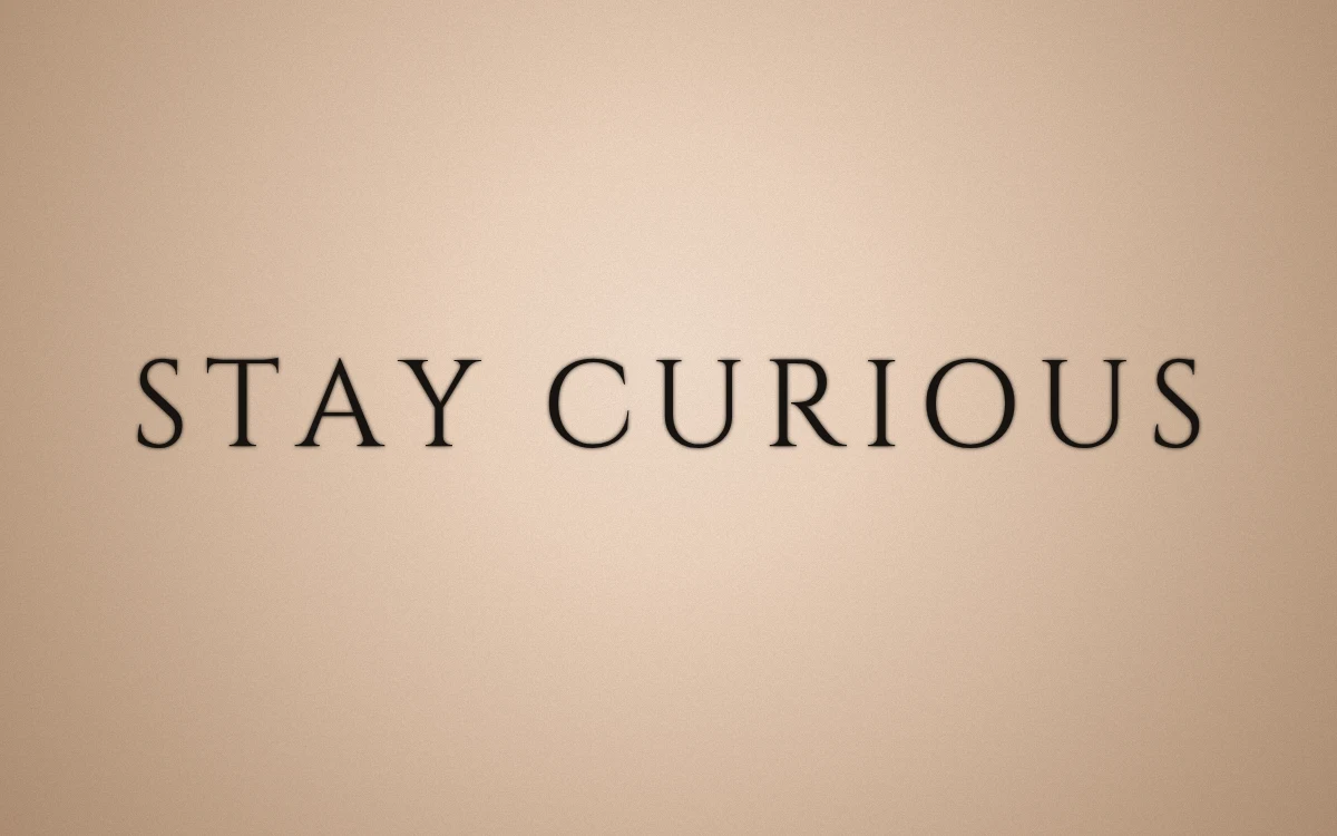 The same STAY CURIOUS phrase in Cinzel with spacing set to 14 pixels