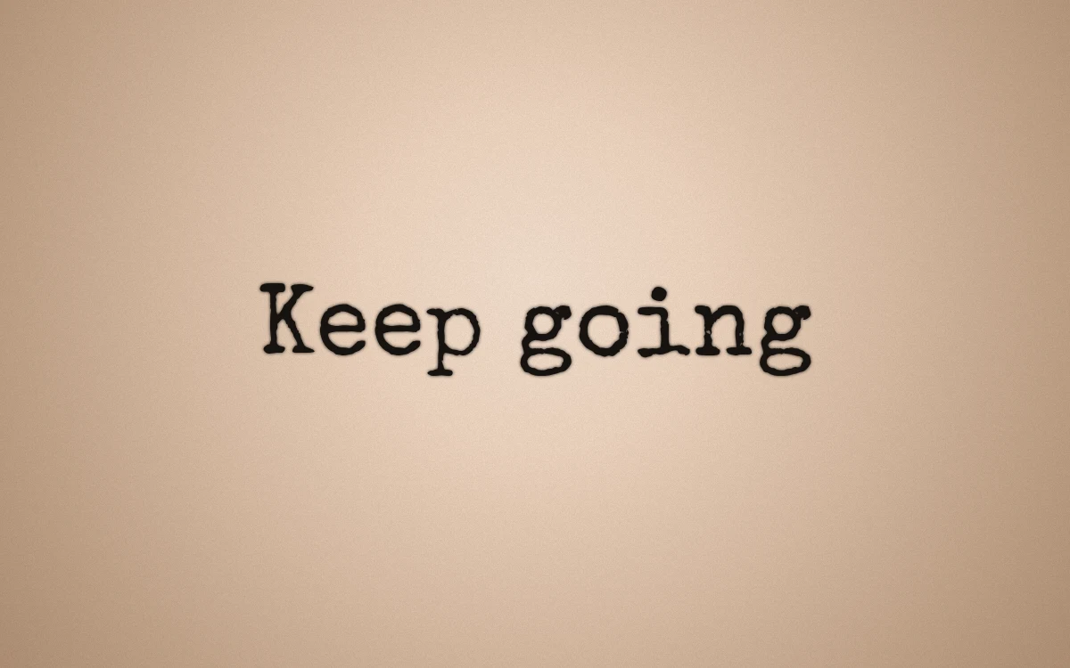 The same Keep going phrase rendered in Special Elite